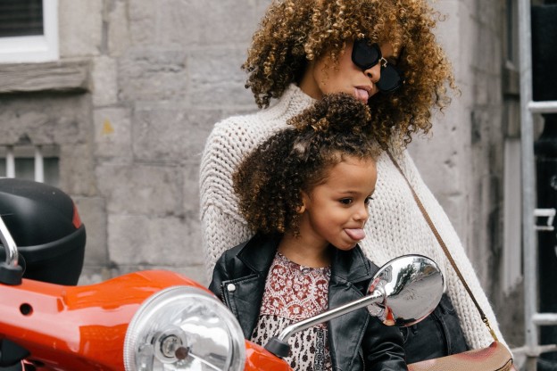 Working mom enjoying time with her daughter after hiring a household assistant.