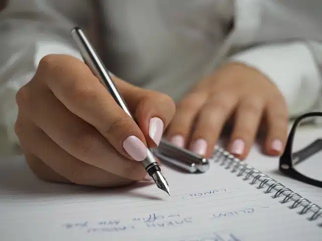 writing on a notepad