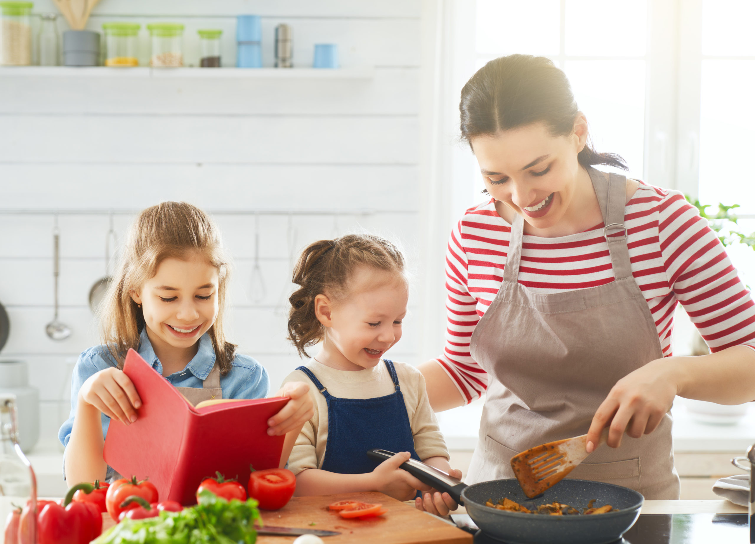 Happy family in the kitchen.