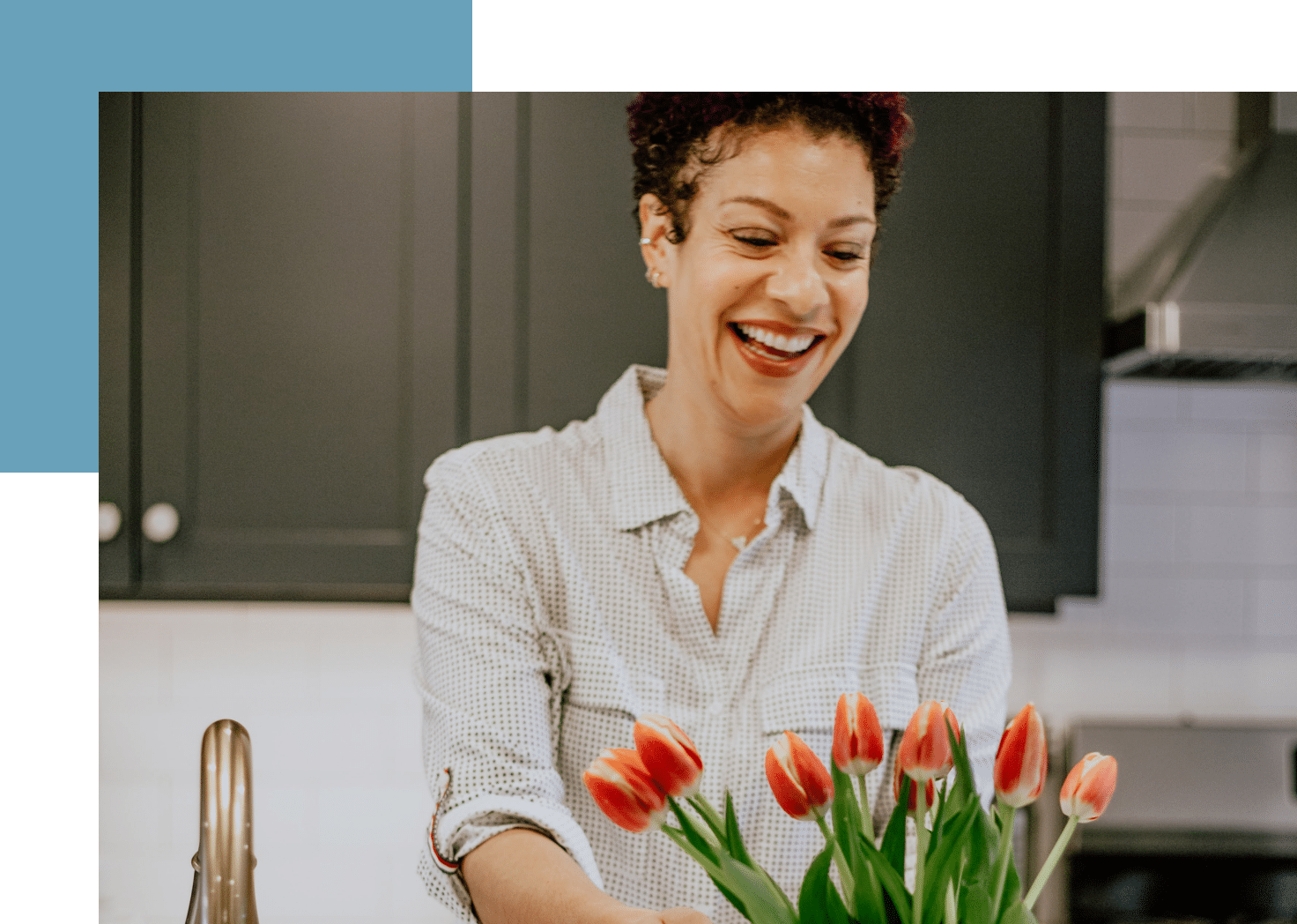 Woman smiling with flowers